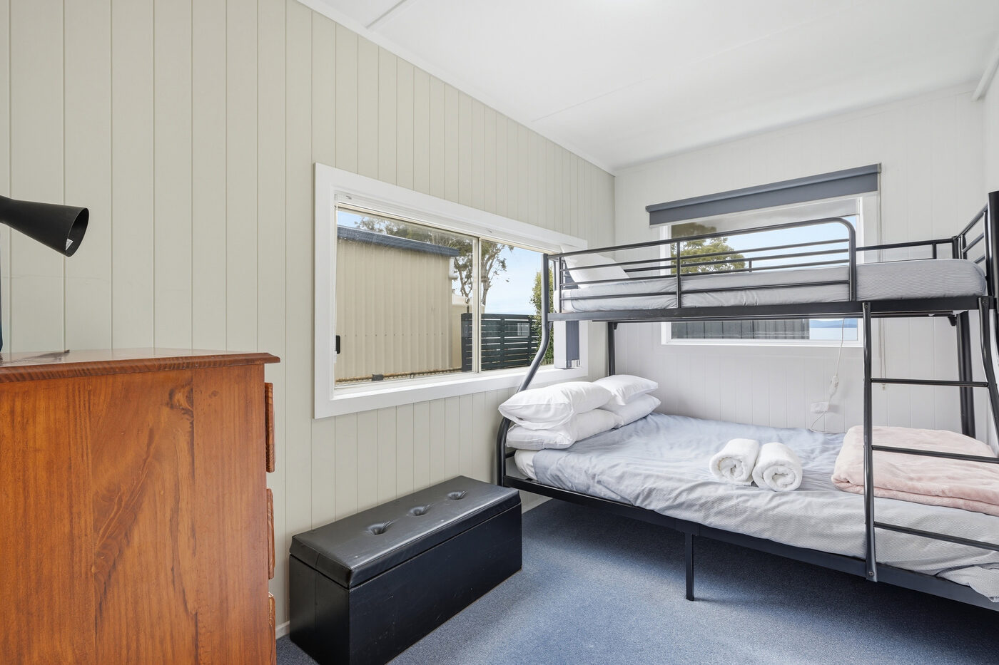 Third bedroom with a double-bottom bunk and single top bunk